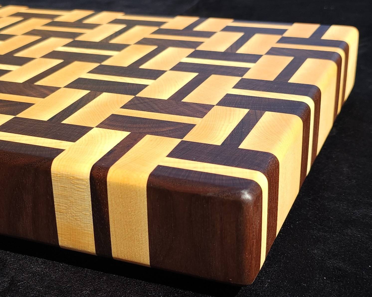 Cutting board made with interchanging pieces of wood